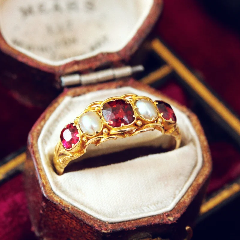 Gothic - Style Women's Rings with Black Onyx and Silver SkullsMid Victorian Garnet & Natural Pearl Ring