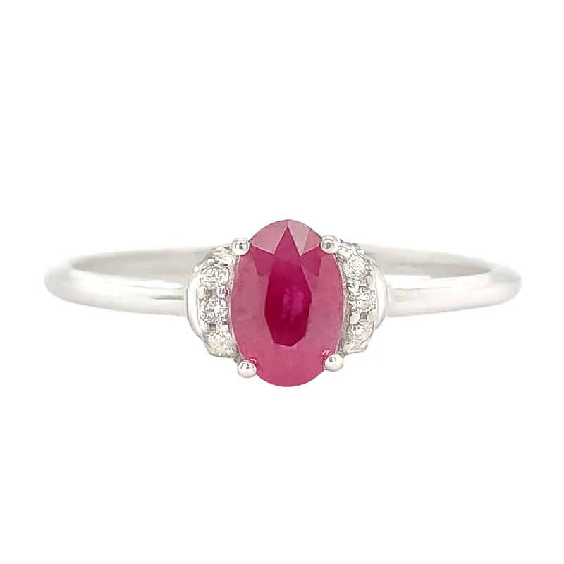 Ruby and diamond engagement ring with a halo of diamonds in 14K red goldPetite Oval Ruby Ring with Diamond Accents on White Gold Band