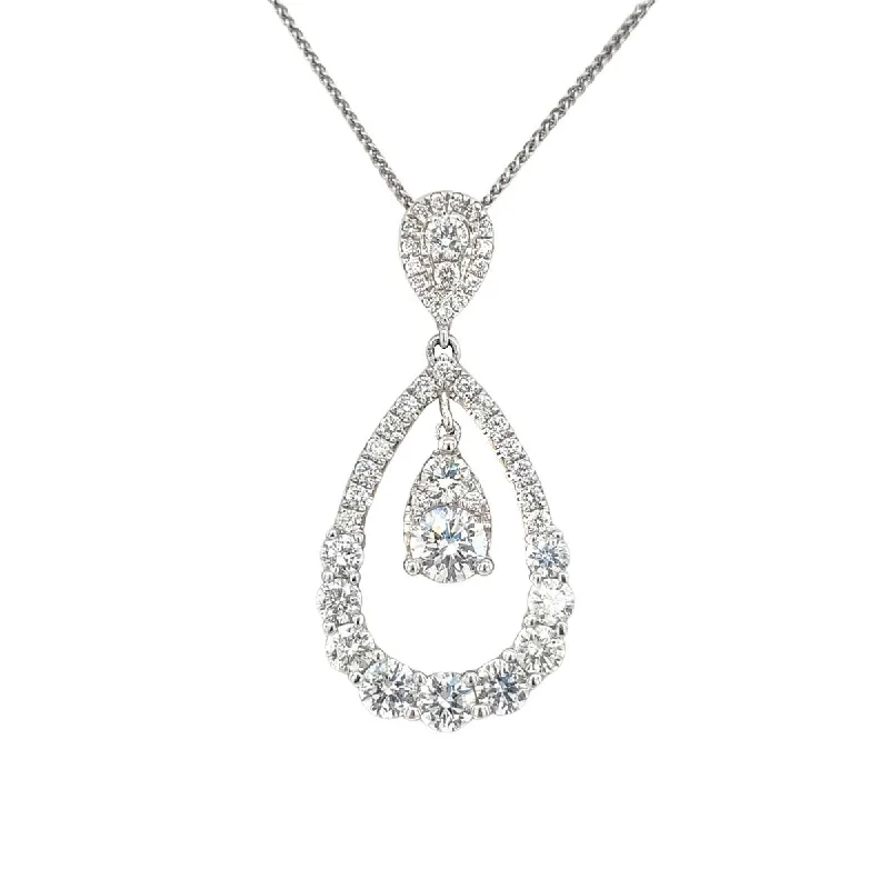 Oval - cut sapphire and diamond engagement ring in 18K white gold"Diamond Double Pear Halo Pendant Drop Necklace in White Gold, 1.33 cttw
"