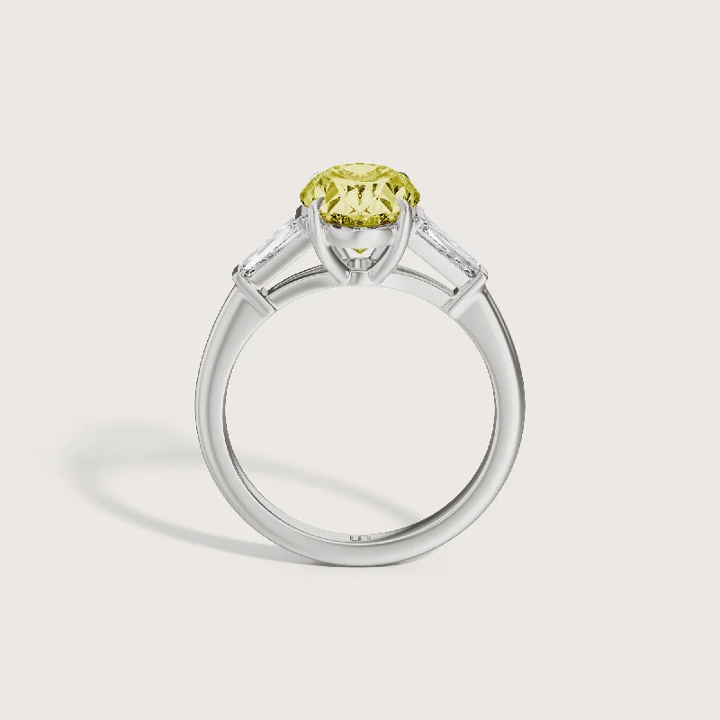 Halo diamond engagement ring in 18K white gold with a center oval - cut stoneMayfair Oval Baguette Trilogy Yellow Diamond