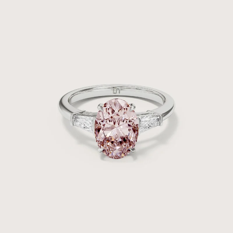 Pear - shaped diamond engagement ring with side baguette diamonds in 18K goldMayfair Oval Baguette Trilogy Pink Diamond