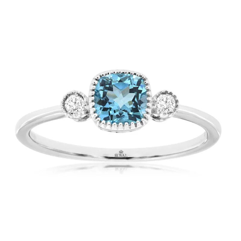 Emerald - cut diamond engagement ring set in a modern titanium bandCushion Cut Swiss Blue Topaz and Round Diamond Three Stone Ring in White Gold