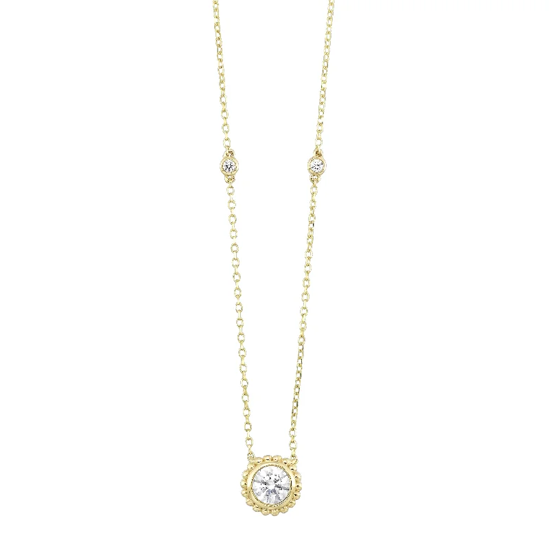 Radiant - cut diamond engagement ring with a bezel - set center stone in 18K yellow goldDelicate Lab-Created Round Diamond Bezel Set Beaded Stationary Necklace in Yellow Gold, 0.33 cttw