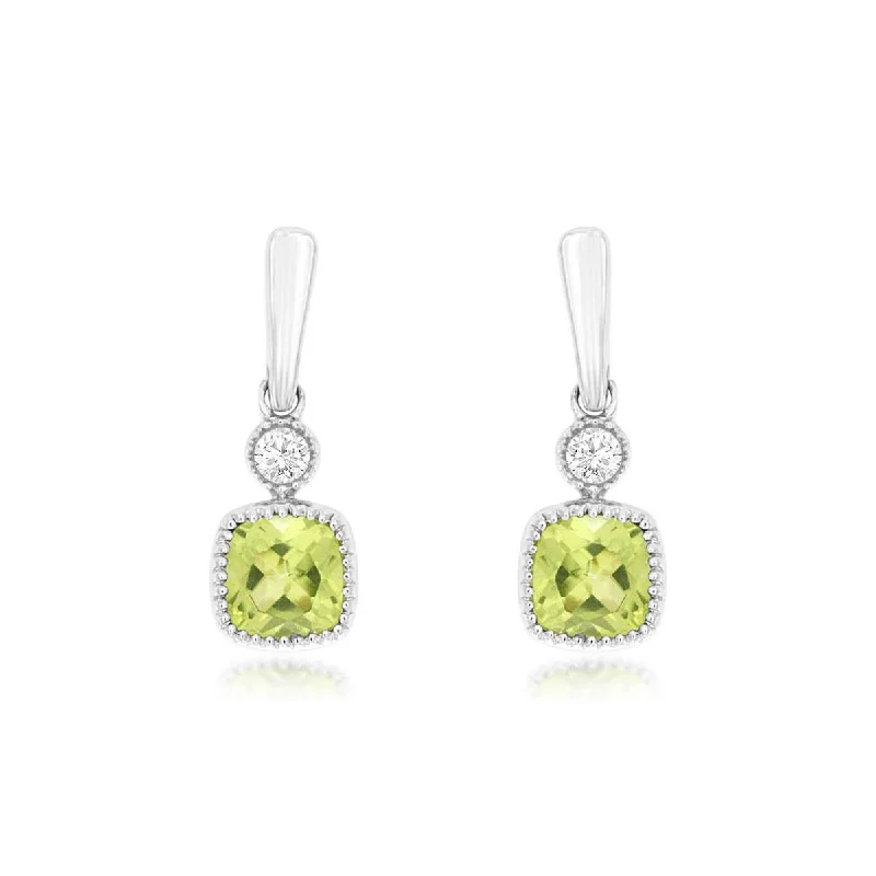 Halo diamond engagement ring in 18K white gold with a center oval - cut stoneCushion Cut Light Green Peridot and Round Diamond Dangle Earrings with Milgrain Edge in White Gold