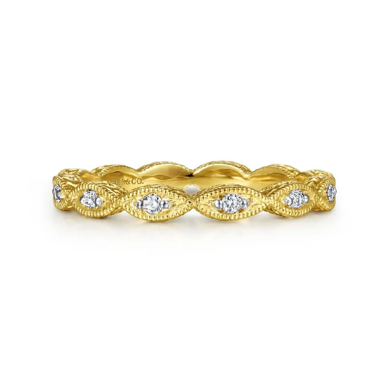 Vintage - style engagement ring with filigree details and sapphire accents in 14K yellow goldMarquise Stacking Band in Yellow Gold