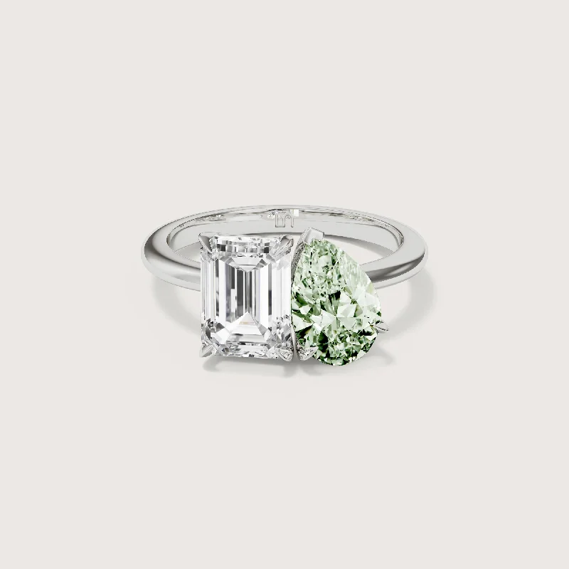 Round - cut diamond engagement ring with a twisted band design in 14K white goldEsther Toi-et-moi Emerald Pear White & Green Diamond