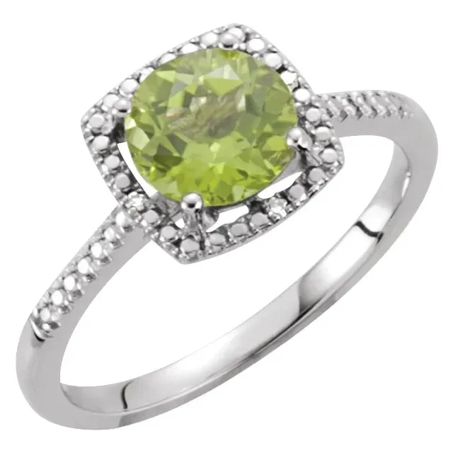 Oval - cut sapphire and diamond engagement ring in 18K white goldRound Natural Peridot Birthstone Ring with Diamond Halo Setting in Sterling Silver