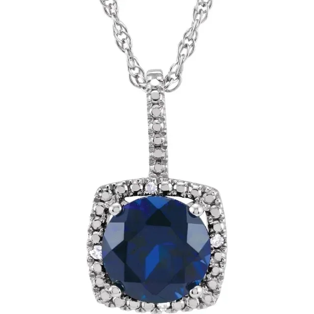 Princess - cut diamond engagement ring with a pavé - set band in platinumLab Grown Round Blue Sapphire Pendant Necklace with Diamond Halo Setting in Sterling Silver