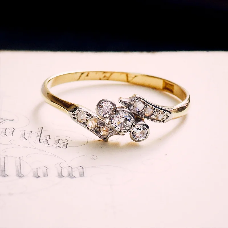 Tennis - Style Women's Rings with a Row of Round Diamonds in PlatinumEnchanting Twinkles! Antique Diamond Crossover Ring