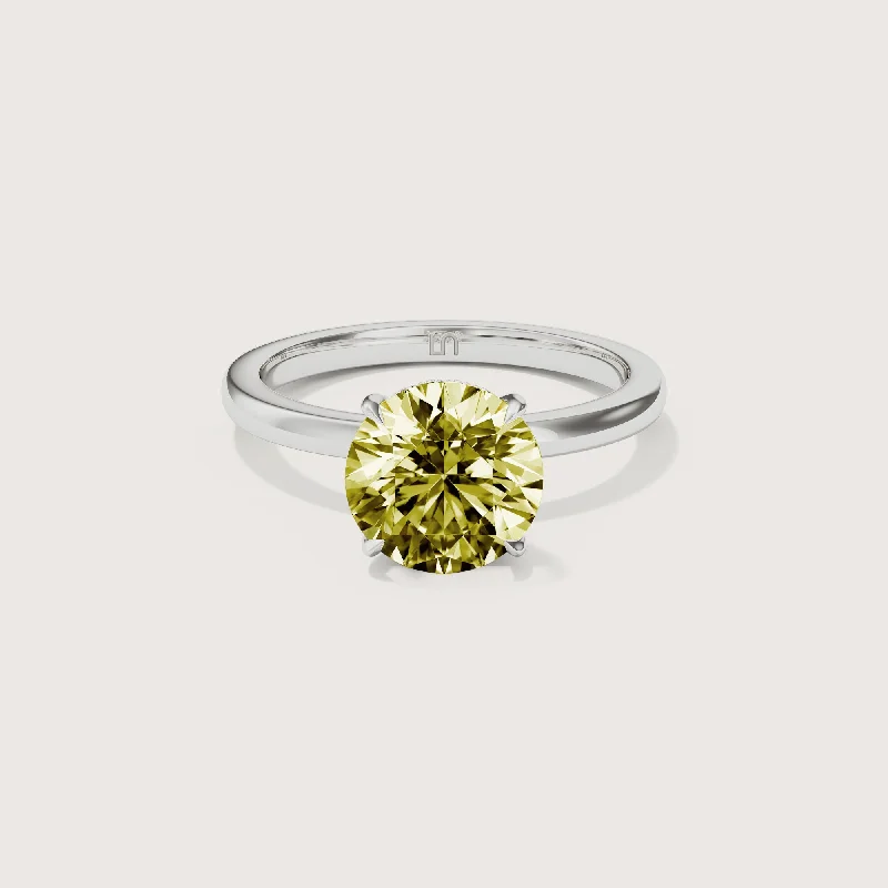 Round - cut diamond engagement ring with a twisted band design in 14K white goldBianca Round Solitaire Yellow Diamond - Hidden Halo