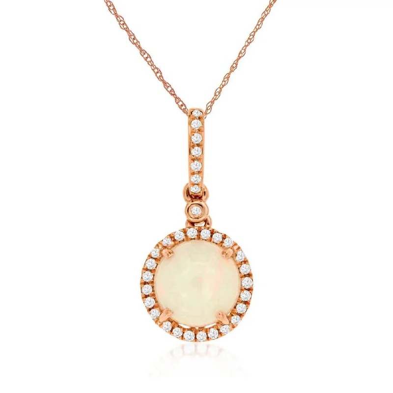 Aquamarine and diamond engagement ring in a 18K white - gold setting with a scalloped edgeRound Cabochon Ethiopian Jelly Opal Pendant Necklace with Diamond Pave Accents in Rose Gold