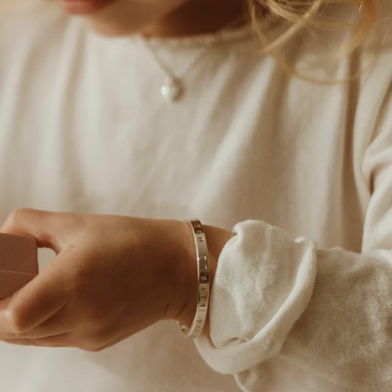 Boho - Style Bangle Bracelets with Feather and Bead EmbellishmentsSignature Cuff Baby Bangle