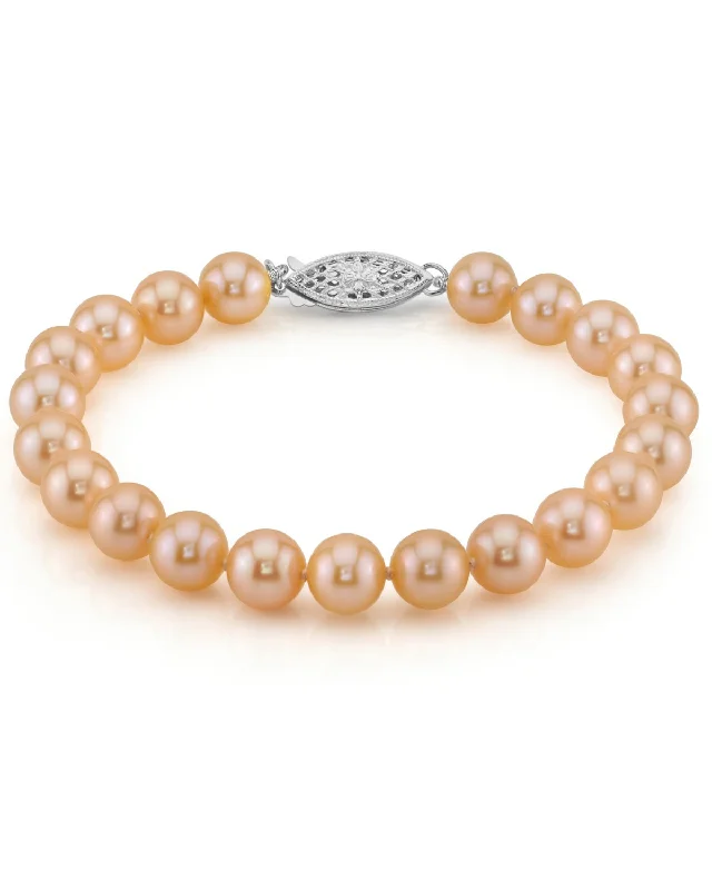 Pearl and Leather Cuff Bracelet with Studded Embellishments for a Rocker - Inspired Style7.0-7.5mm Peach Freshwater Pearl Bracelet - AAAA Quality