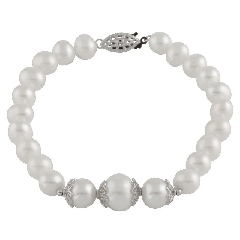 Hand - Knotted Freshwater Pearl Bracelet with Silk Thread for a Delicate LookSterling Silver Graduated Freshwater Pearl Bracelet