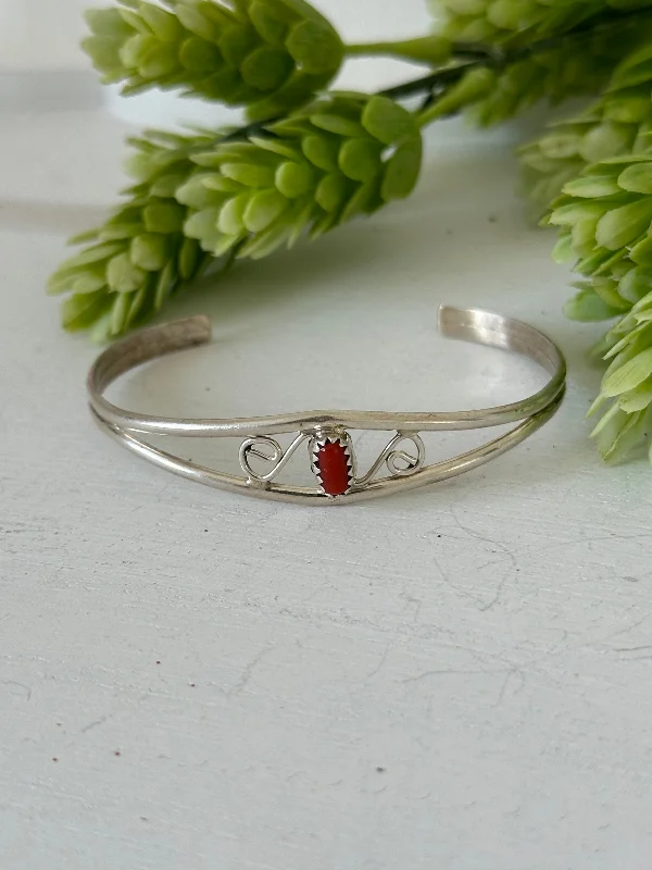 Wooden Women's Cuff Bracelets with Carved Motifs for a Natural and Artistic LookNavajo Made Red Coral & Sterling Silver Cuff Bracelet