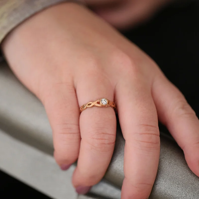 Adjustable Engagement Rings with a Flexible Band and a Princess - Cut Center DiamondCeltic Twist 0.22ct Diamond Solitaire Ring in 9ct Rose Gold