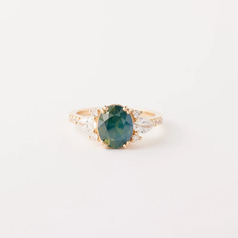 Solitaire Engagement Rings with a High - Clarity Round Diamond and Tapered BandRosalind Ring - 2.23 Carat Opalescent Teal Oval Sapphire