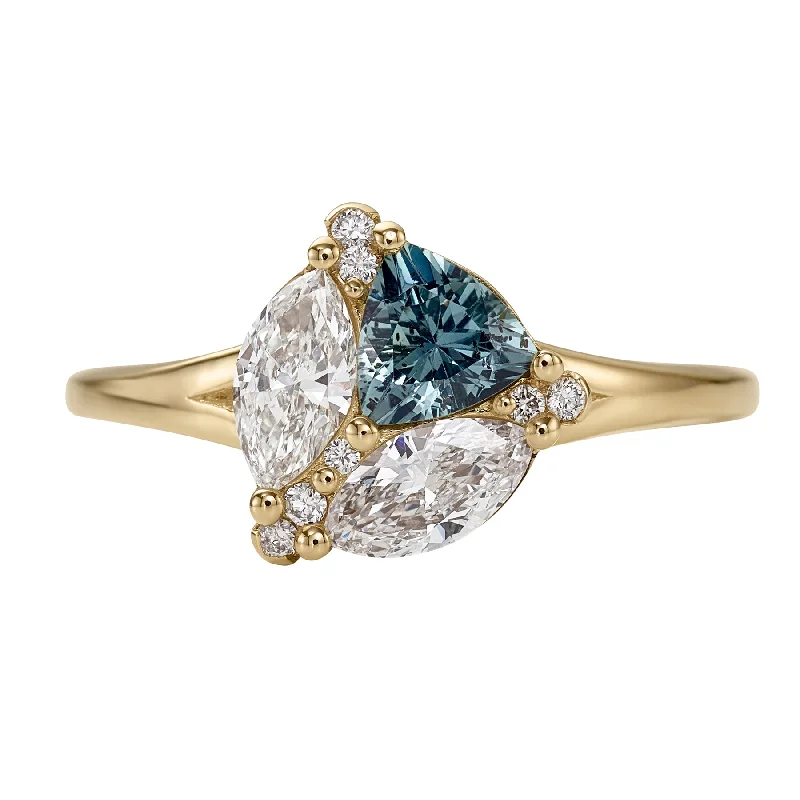 Art Deco Engagement Rings with Geometric Patterns and Baguette - Cut Diamond AccentsSerene Trillion Teal Sapphire and Marquise Diamond Engagement Ring