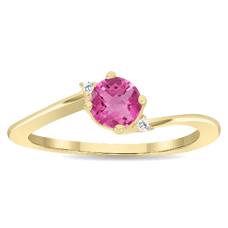 Iolite Gemstone Rings in 10K Gold with a Twisted Band for a Distinctive and Stylish AccessoryWomen's Round Shaped Pink Topaz and Diamond Wave Ring in 10K Yellow Gold