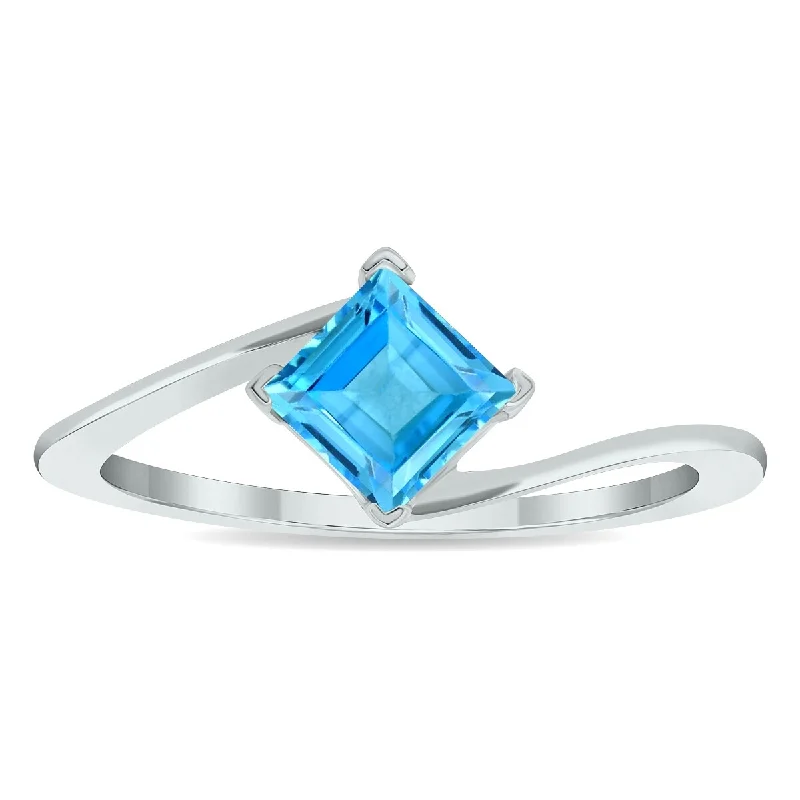 Alexandrite Gemstone Rings in Platinum with a Hidden Halo for a Rare and Luxurious PieceWomen's Solitaire Blue Topaz Wave Ring in 10K White Gold